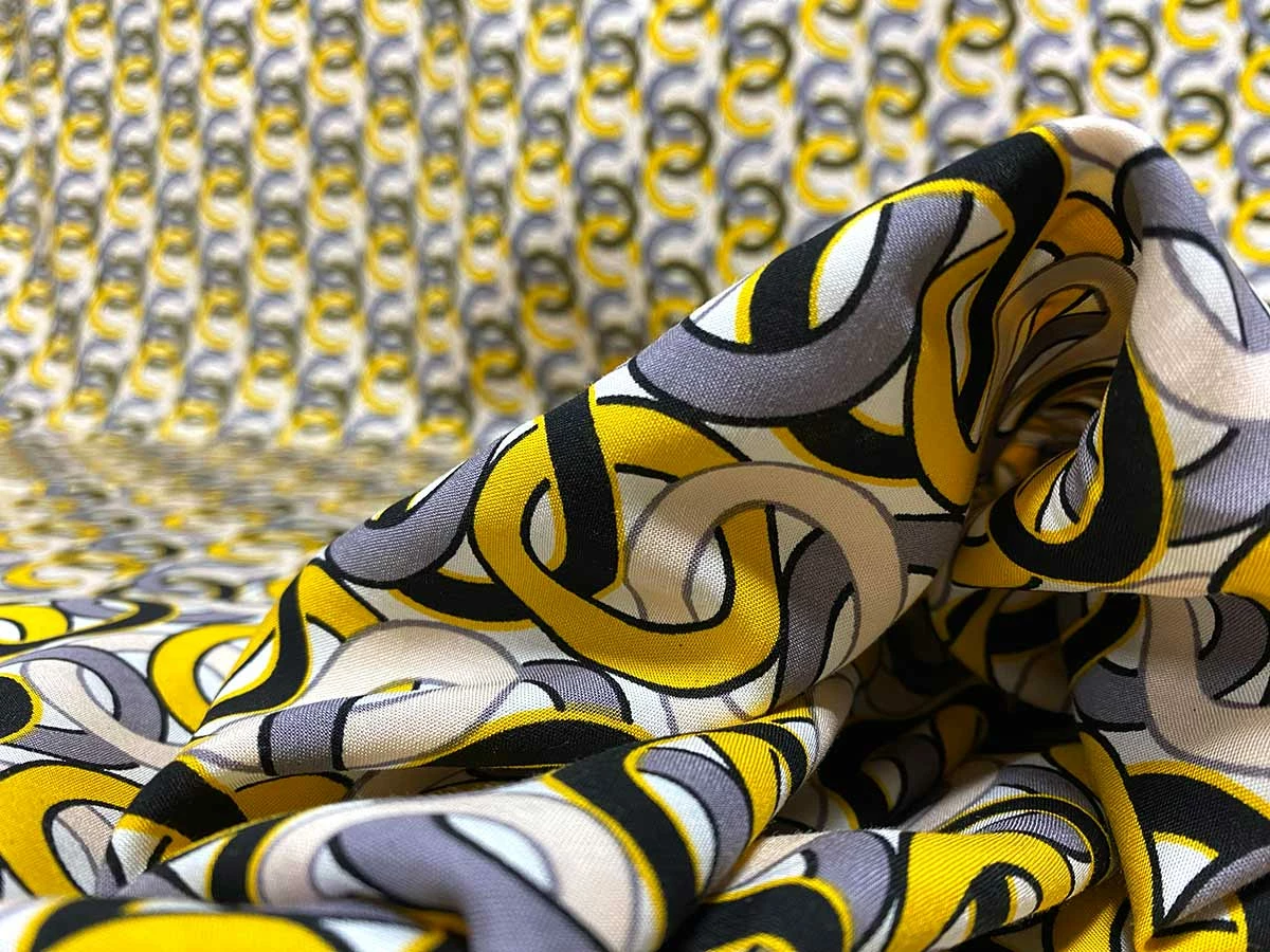 VF234-38 Idiom Rings - Gold With Black And Blush Interlocking Circles On White Rayon Challis Fabric 4 VF234-38 Idiom Rings - Gold With Black And Blush Interlocking Circles On White Rayon Challis Fabric - Image 2